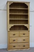 Victorian waxed pine dresser, five heights bookcase above two short and two long drawers, W112cm,