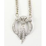 Diamond set platinum pendant on later hallmarked silver chain Condition Report