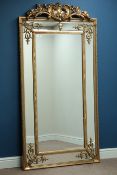 Large rectangular wall mirror in ornate gilt cushion frame with pediment,