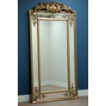 Large rectangular wall mirror in ornate gilt cushion frame with pediment,