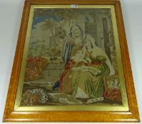 Victorian Needlework St Anne in birdseye maple frame,