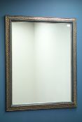 Large wall mirror in black and gilt frame,