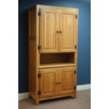 Light oak cabinet fitted with four cupboards, W104cm, H195cm,