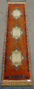 Contemporary native tribal style rust ground runner rug,