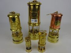 Five brass and copper miners lamp,