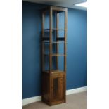 Narrow stained oak shelving unit with cupboard, W44cm, H214cm,