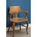 Early 20th century oak armchair, figured oak seat,