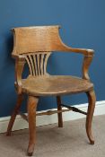 Early 20th century oak armchair, figured oak seat,