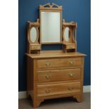 Edwardian satin walnut three drawer dressing chest, with triple mirror back and two trinket drawers,