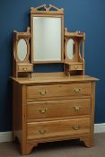 Edwardian satin walnut three drawer dressing chest, with triple mirror back and two trinket drawers,