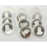 Twelve 1999 Queen Elizabeth II Royal Houses Gibraltar silver proof crowns (in capsules)