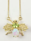 Peridot and opal insect silver-gilt pendant necklace Condition Report <a