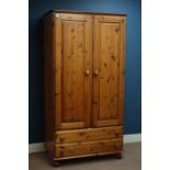 Ducal polished pine double wardrobe with two drawers to base, W96cm, H185cm,