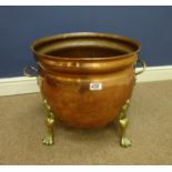 19th/ early 20th Century Copper cauldron with brass paw feet, H41.