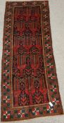 Persian Baluchi rug, 272cm x 107cm Condition Report <a href='//www.