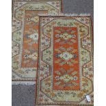 Two Turkish orange and beige ground rugs 130cm x 80cm Condition Report <a
