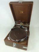 'His Master's Voice' wind up gramophone with brown felt table,