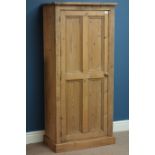 Waxed pine cupboard enclosed by single panelled door, two shelves to interior, W66cm, H143cm,