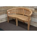 Solid teak dowel jointed serpentine garden bench,