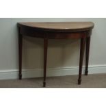 George III mahogany demi-lune fold over tea table, on twin gateleg base, tapering spade foot legs,