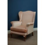 Mid 20th century walnut framed upholstered wingback armchair