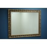 Ornate gilt framed rectangular mirror, bevelled glass,