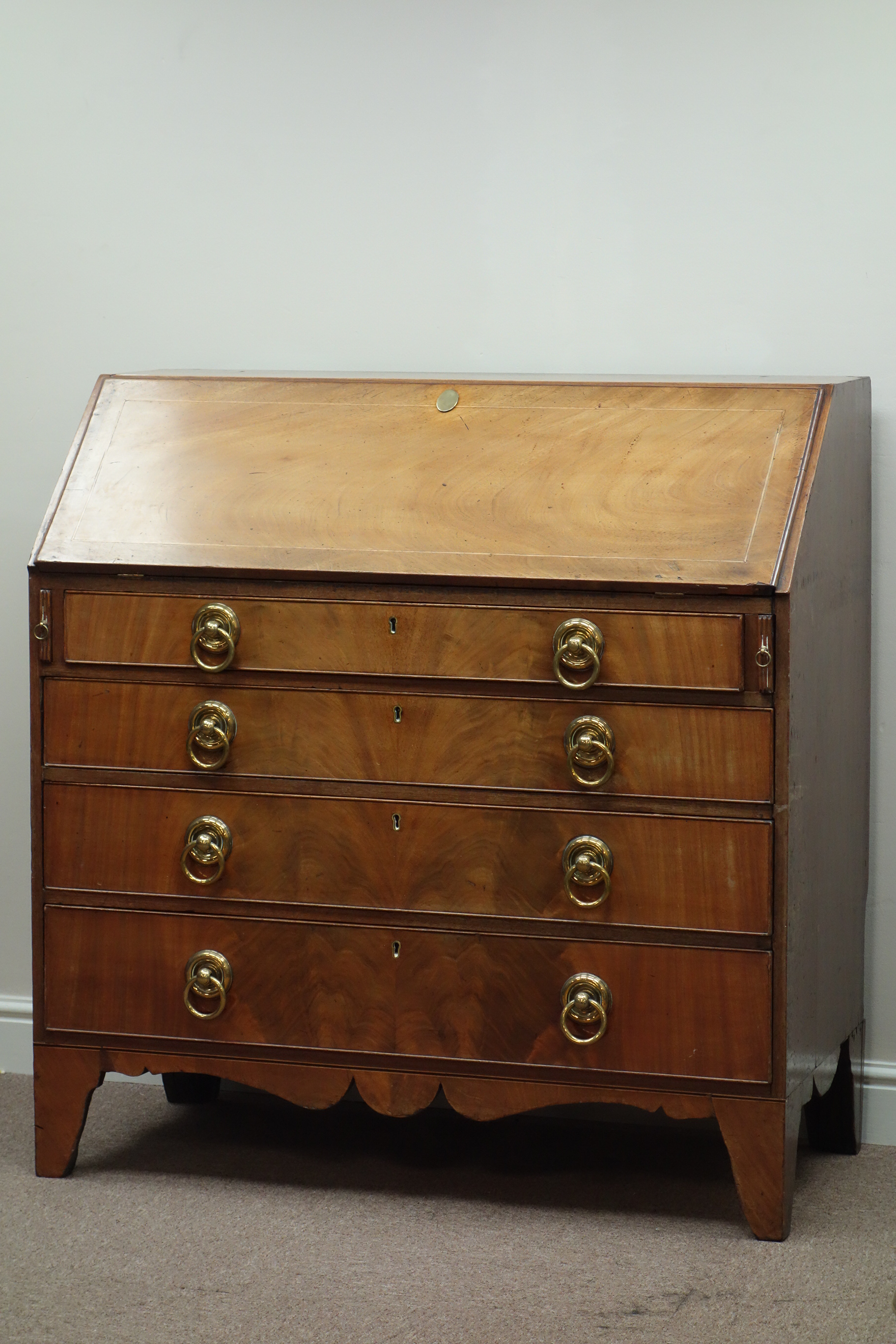 Georgian mahogany fall front bureau, four graduating drawers, shaped apron, bracket feet, W108cm,