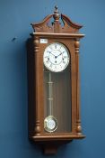 Hermle walnut cased wall hanging clock, chiming movement,