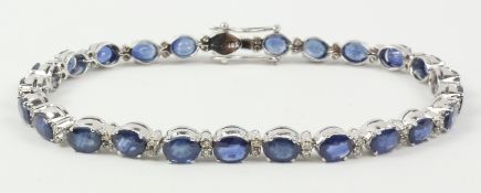 Oval sapphire and diamond bracelet stamped 18k Condition Report <a href='//www.