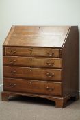 18th century oak bureau banded in walnut, fall front with well fitted interior,