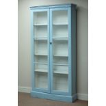 Early 20th century painted bookcase enclosed by two glazed doors, W95cm, H187cm,