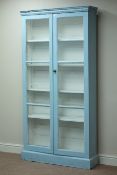 Early 20th century painted bookcase enclosed by two glazed doors, W95cm, H187cm,