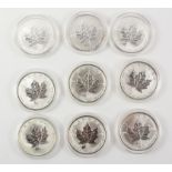 Nine Canadian maple leaf $5 silver proof coins all with privy marks (in capsules)