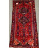 Persian Hamadan red ground rug, 200cm x 96cm Condition Report <a href='//www.