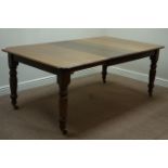 Early 20th century oak telescopic dining table with two leaves,