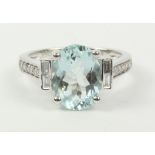 Oval aquamarine and diamond white gold ring hallmarked 18ct (aqua approx 2.