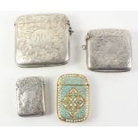 Three Victorian and later hallmarked silver vesta cases and a brass and enamel vesta