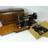 Singer sewing machine with Singer electric motor in original box and other parts and accessories