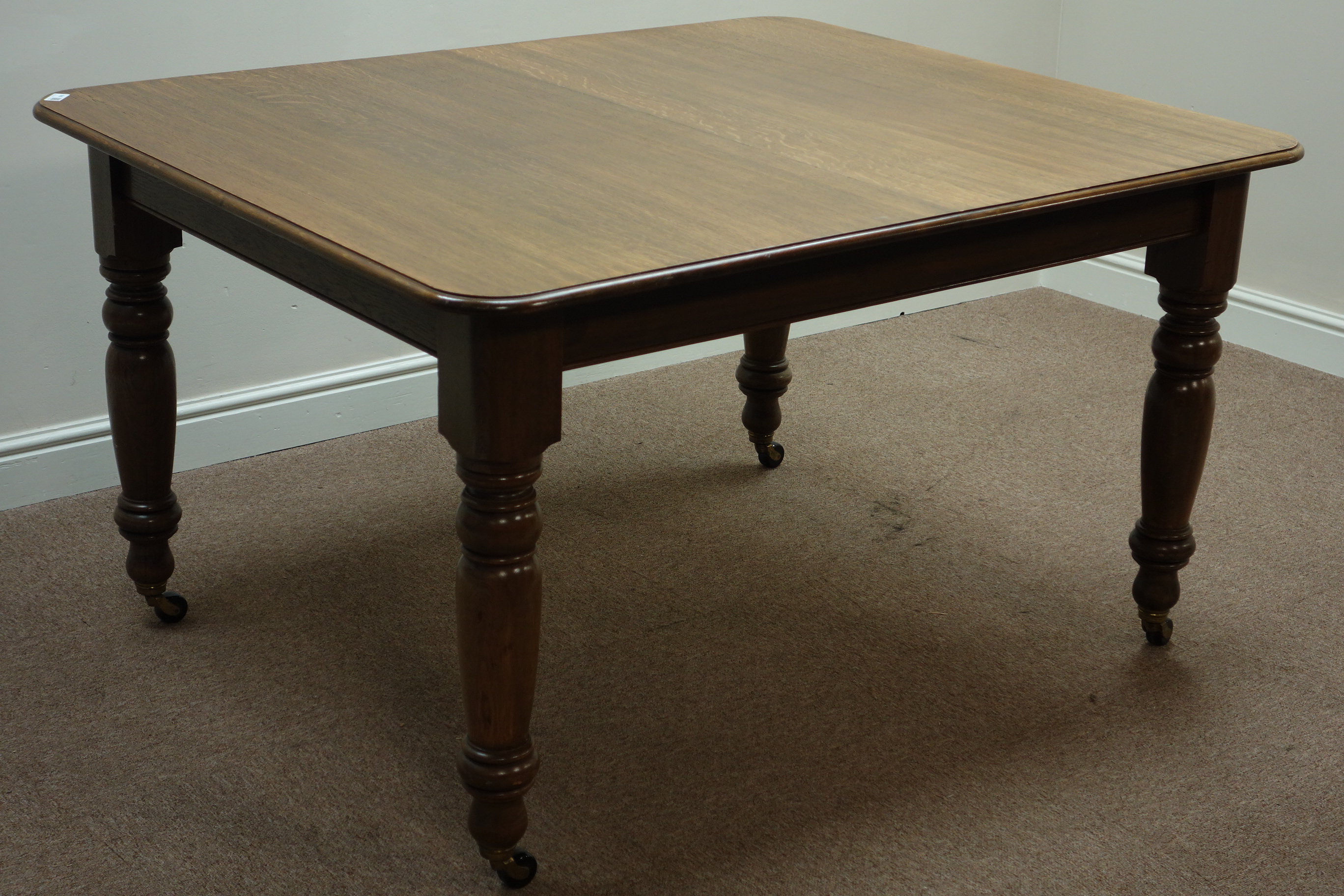 Early 20th century oak telescopic dining table with two leaves, - Image 2 of 2