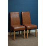 Pair high back armchairs upholstered in tan leather