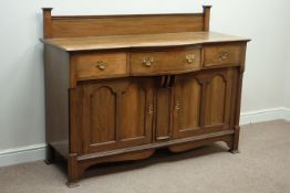 Early 20th century oak bow break front sideboard, three drawers,