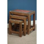 Nest of three Eastern style painted hardwood occasional tables,