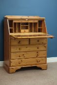 Ducal polished pine bureau fall front above slide, two short and three long drawers (W88cm, H114cm,