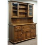 Ercol golden dawn dresser, four drawers and cupboards,