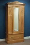 Edwardian satin walnut single wardrobe, single bevelled mirror glazed door, and drawer to base,