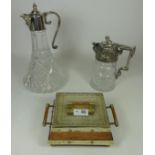 Edwardian cut glass claret jug with silver plated mounts and later claret jug with silver plated