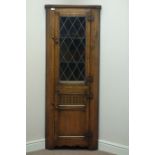 Medium oak corner display cabinet with lead glazed door, W66cm,