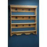 19th century waxed pine three tier plate rack, W111cm,