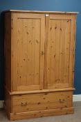 Large pine tall boy panelled doors with single drawer to base, W102cm, H155cm,
