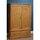 Large pine tall boy panelled doors with single drawer to base, W102cm, H155cm,